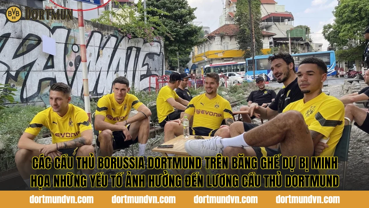 Các cầu thủ Borussia Dortmund trên băng ghế dự bị minh họa những yếu tố ảnh hưởng đến lương cầu thủ Dortmund